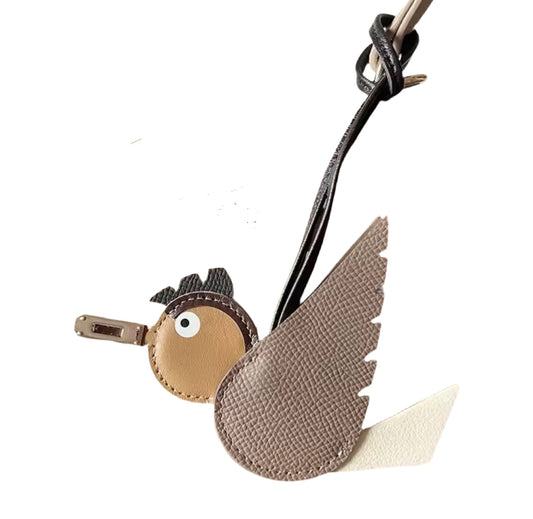 Beige bird charm